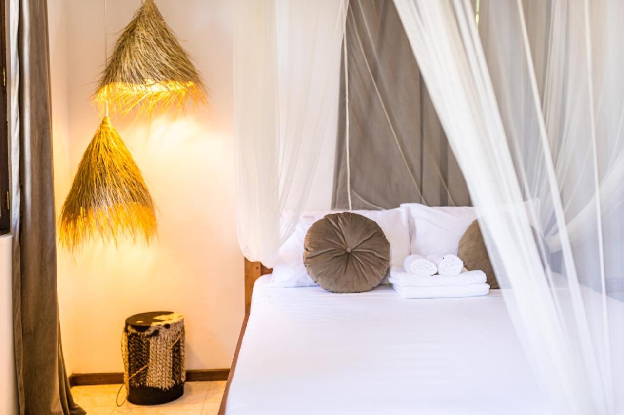 Kima Serviced Beach House & Suites Буейю Екстериор снимка