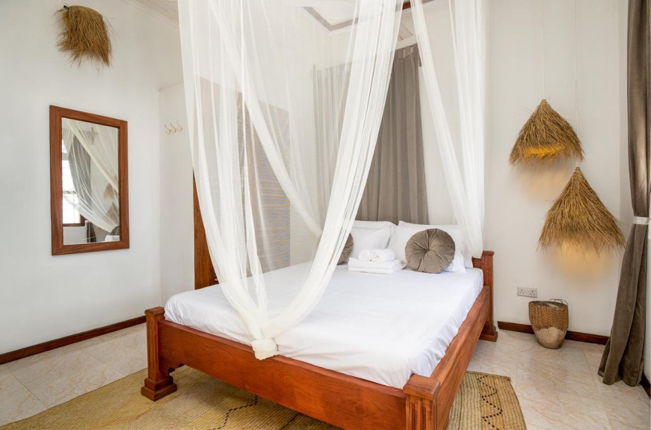 Kima Serviced Beach House & Suites Буейю Екстериор снимка
